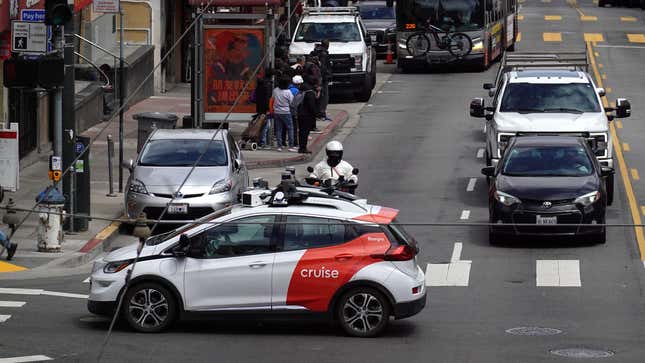A Chevrolet Cruise autonomous vehicle with a driver moves through an intersection on June 08, 2023 in San Francisco, California.